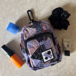FABRIC SHREDS 251.121 MINI BACKPACK TRINKET