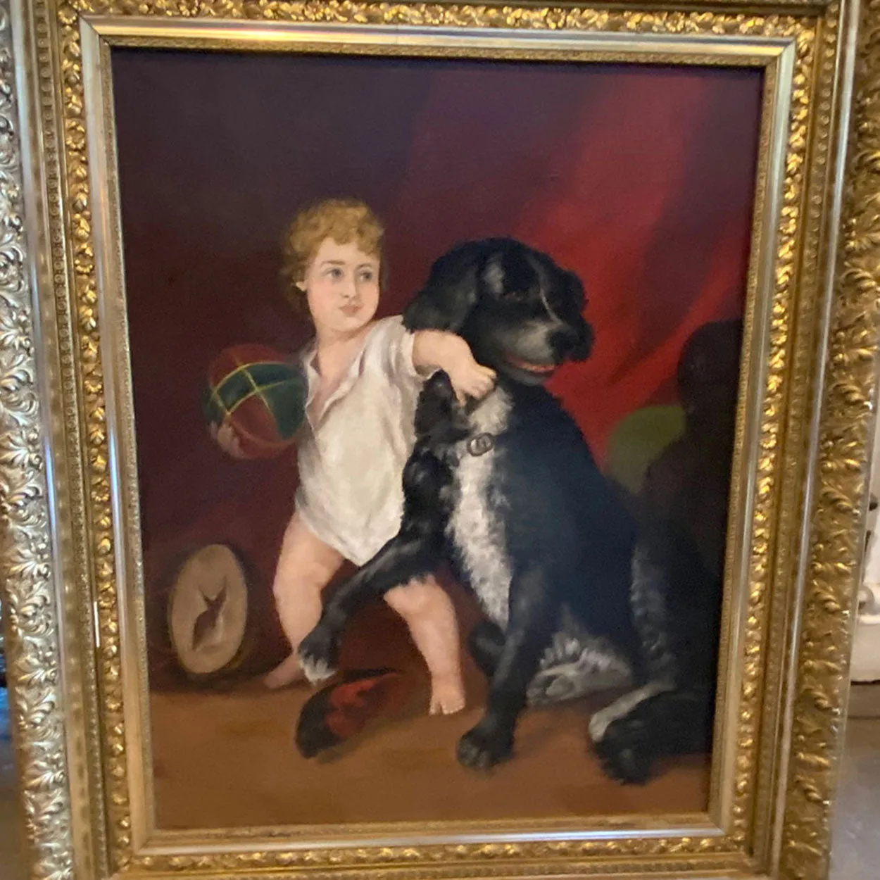 Large English School Oil on Canvas Painting, Interior with a Boy and Dog Playing