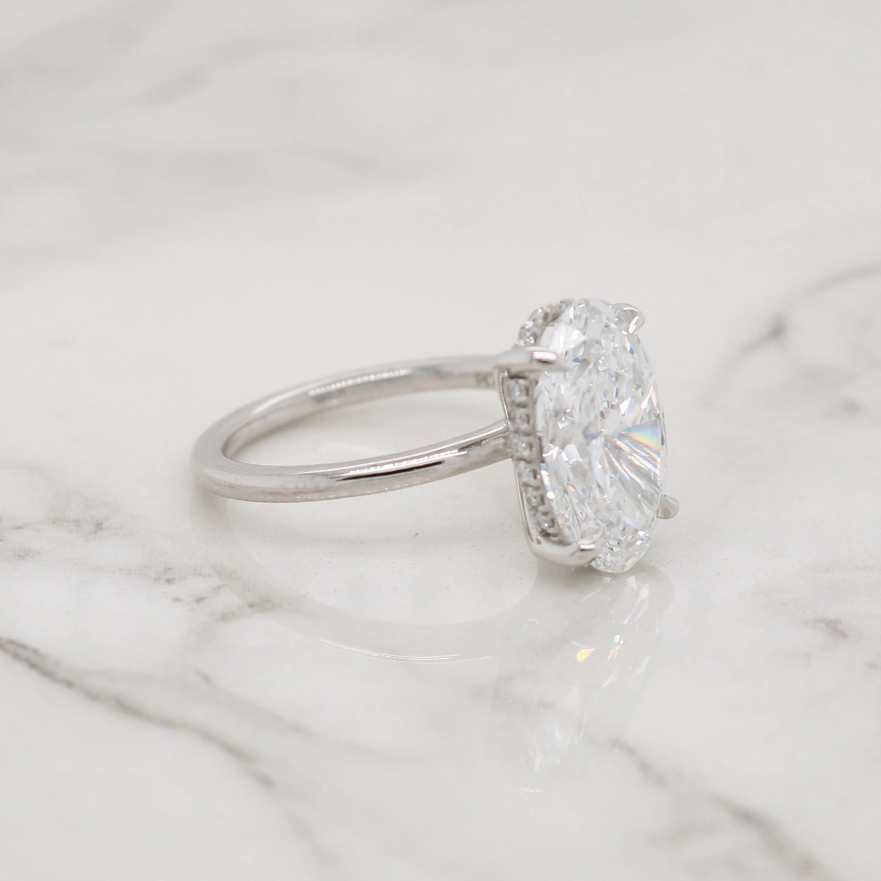 Oval Solitaire with Hidden Halo