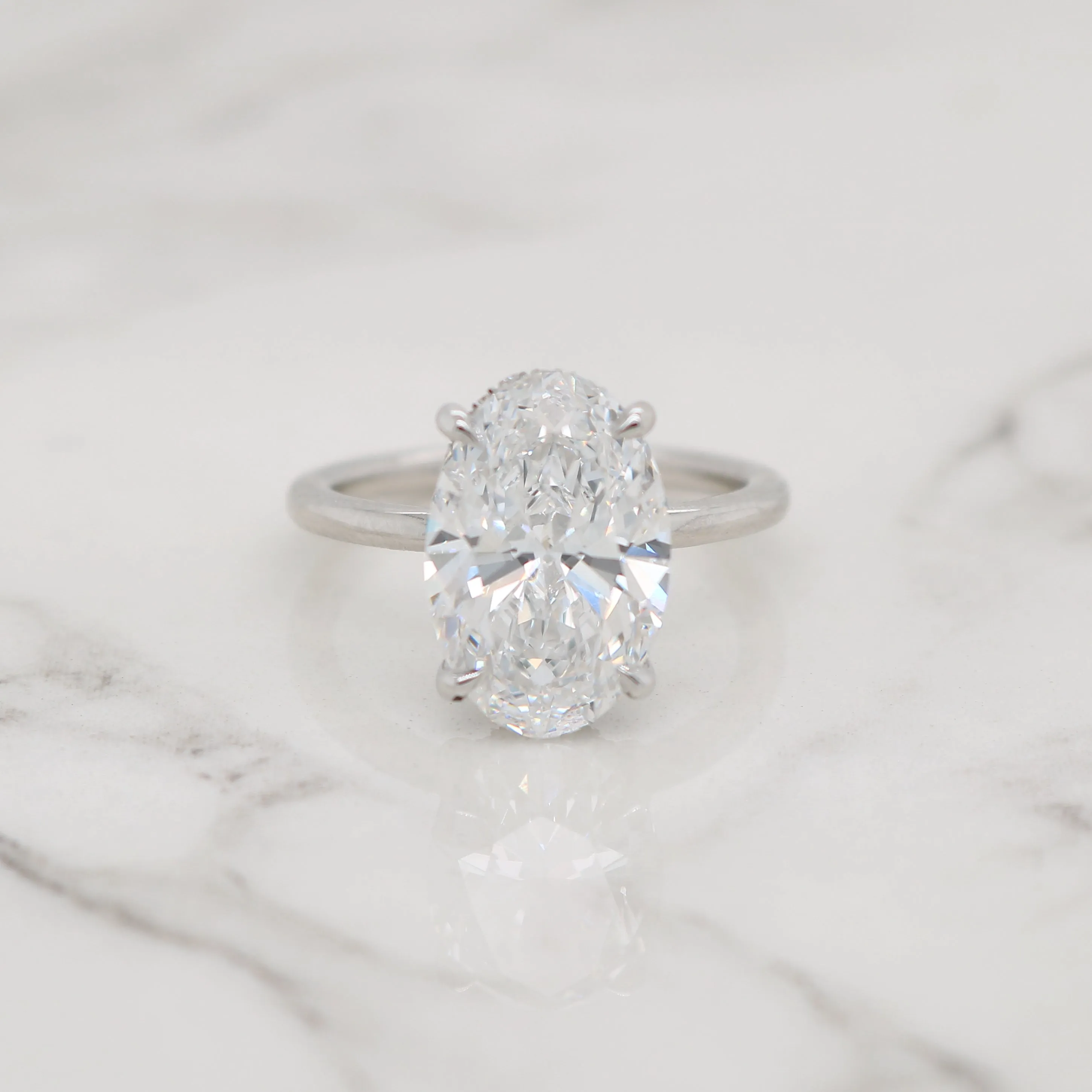 Oval Solitaire with Hidden Halo