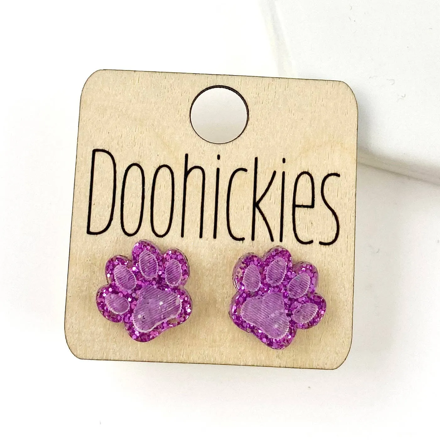 Paw Stud Earrings: Purple Glitter Doohickie