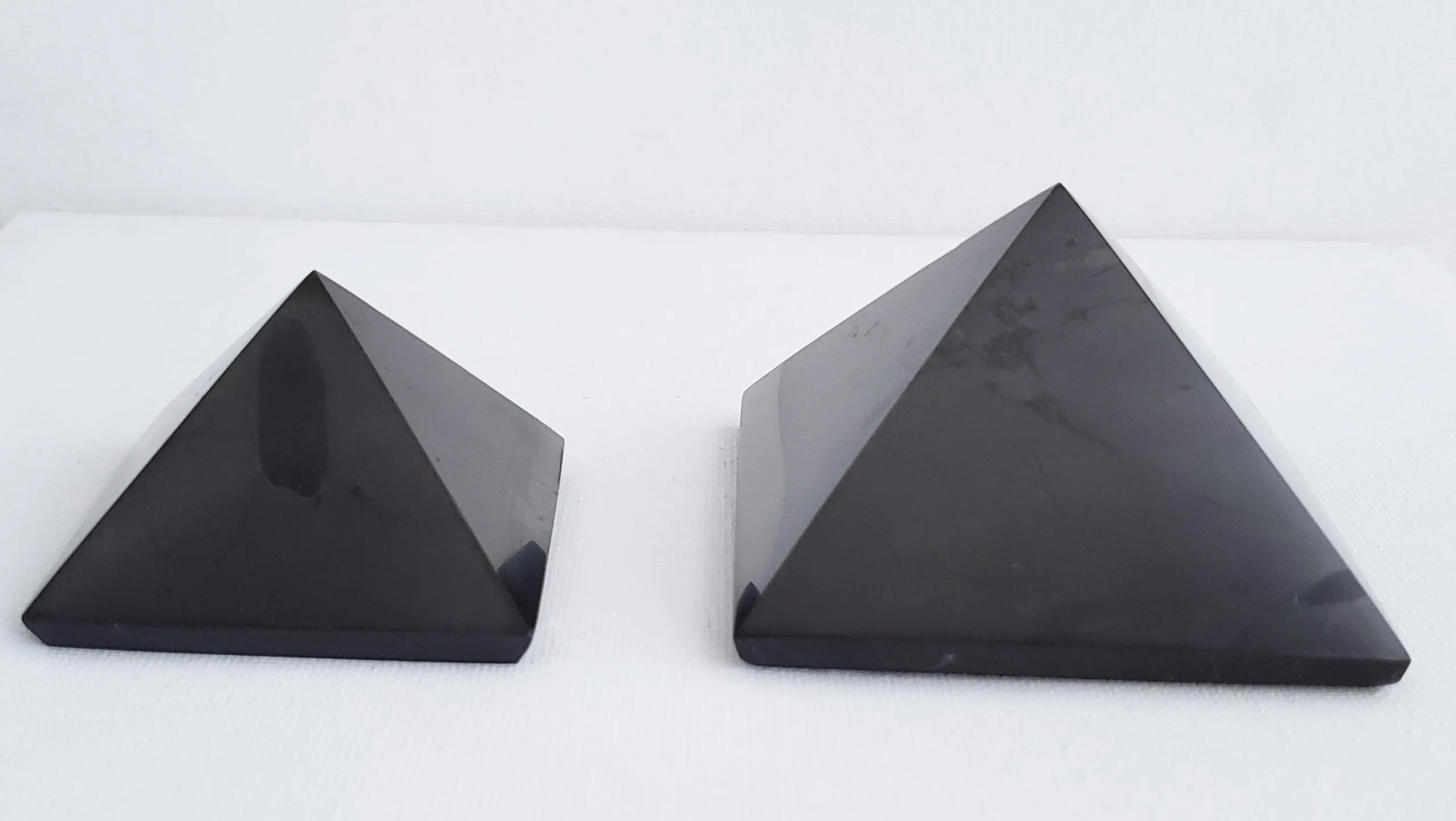 Shungite Medium Size Pyramid Harmonizes Energy Within the Home or Office Space.